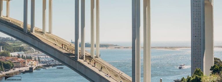 Climb the Arrabida bridge at sunset, the perfect end to your one day trip Porto