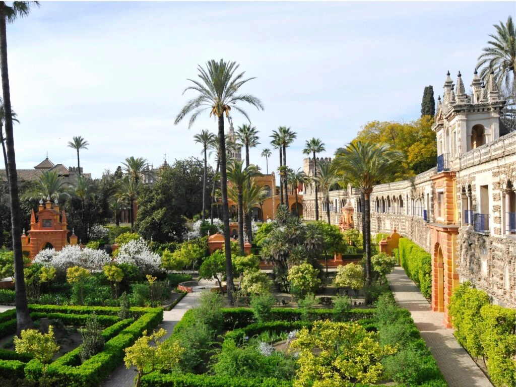 symettrical gardens including heding and palms