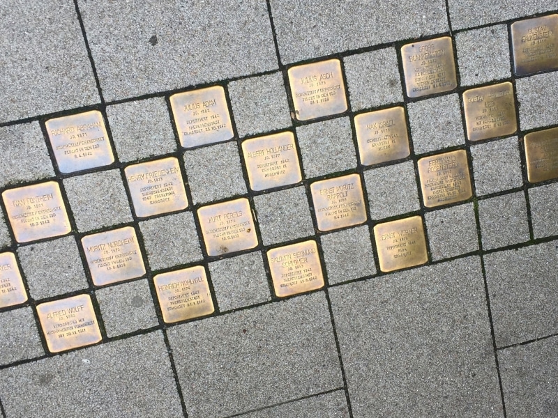 Paving stones with square brass engraved memorial blocks