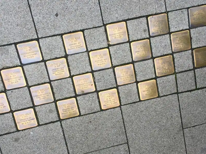 Paving stones with square brass engraved memorial blocks