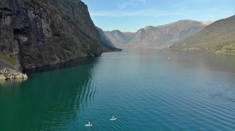 Flam stand up paddle on turquoise fjord