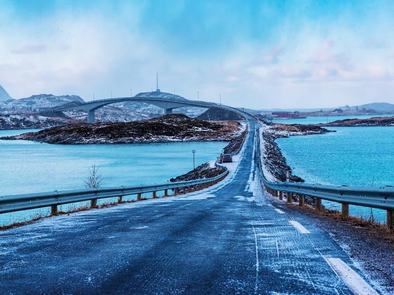 Icy Norway road and bridge in winter