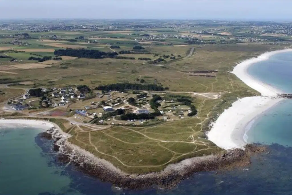 Aerial view of a small peninsula surrouned by sandy beaches