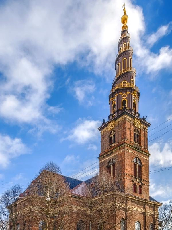 tall church spire with gold decoration
