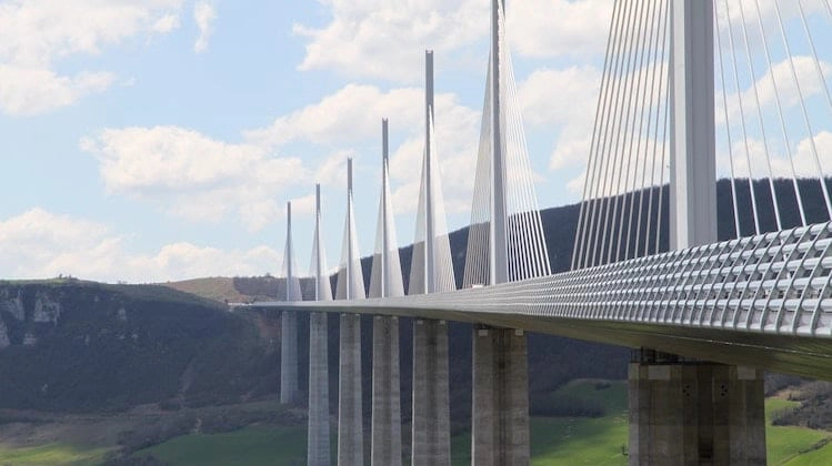 Huge bridge spanning a valley with many steel girders