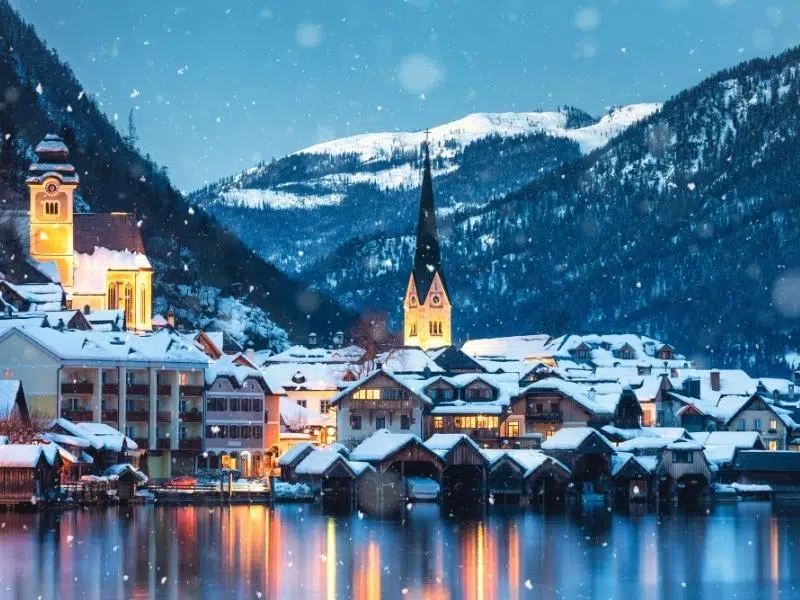 Church and small village with mountain backdrop 