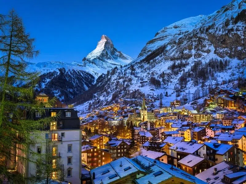 Mountain town with snow covered roofs