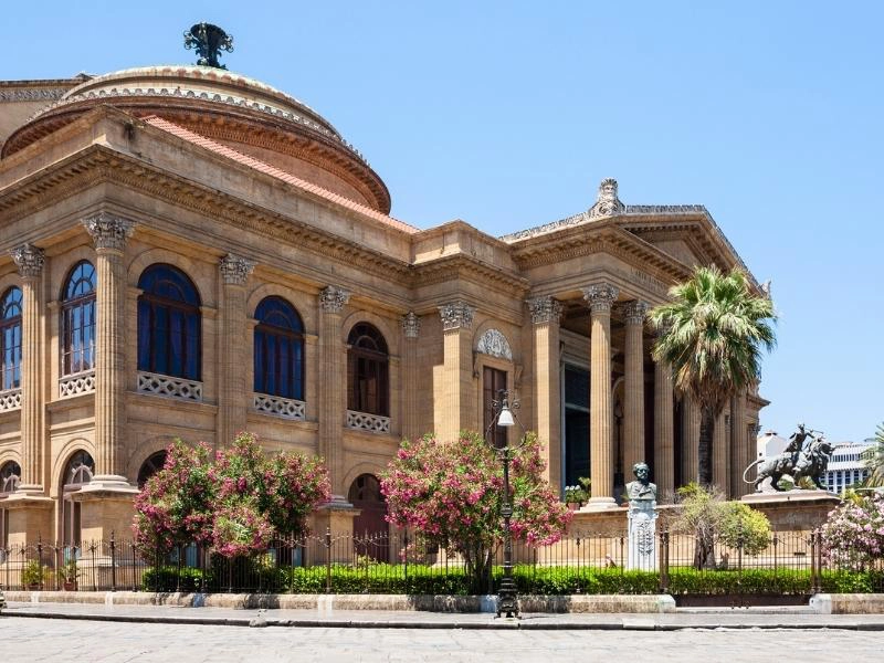 large theatre with sic columns at the entrance