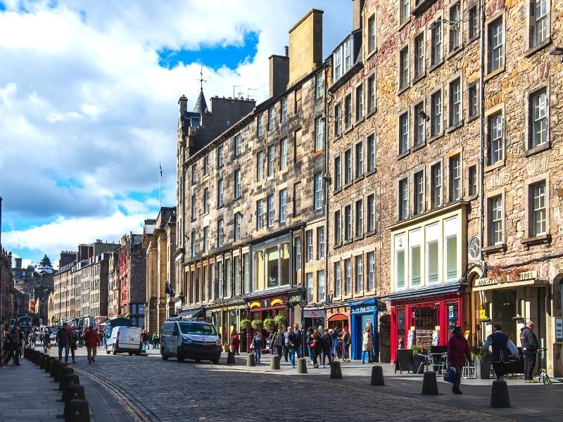 wide street lined with cobbled and elegant buildings