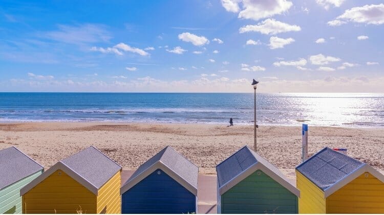 Colourful beachuts facing bournemouth beach