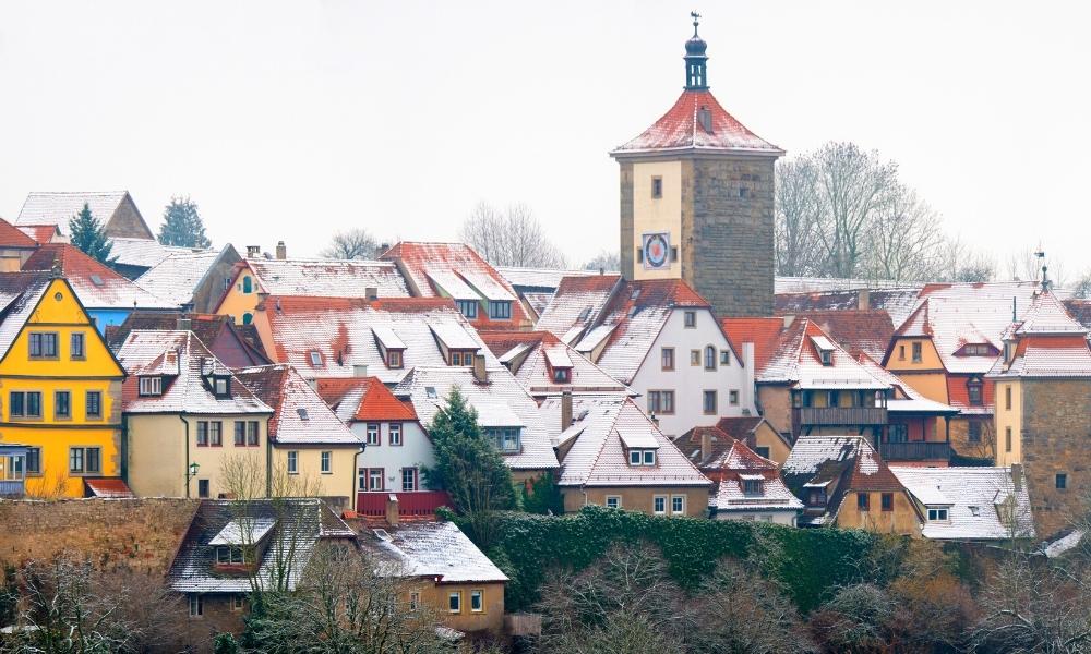 German menideval town with snow on the rooftops