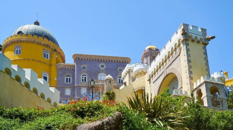 Yello ane mauve buildings of Pena Palace in Sintra