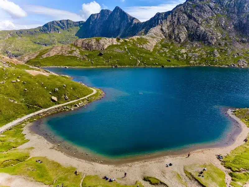 This location is Llyn Glaslyn a glacial lake located approximately 600 meters above sea level within Snowdonia National Park in Wales.