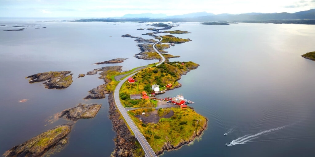 winding road across islands and sea in Norway