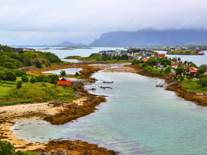 small village and harbour with red roofed houses