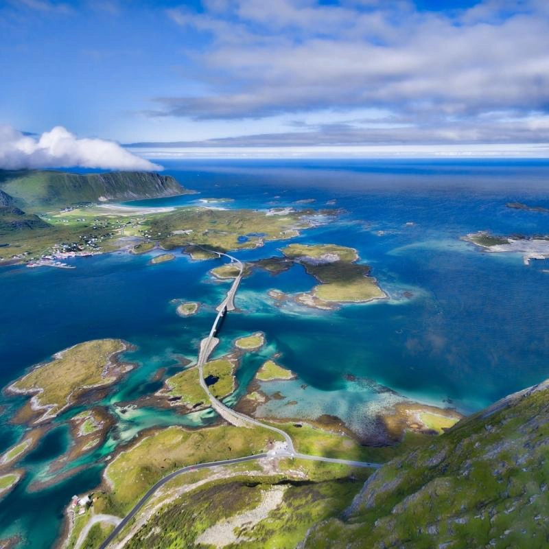 road between islands and blue sea