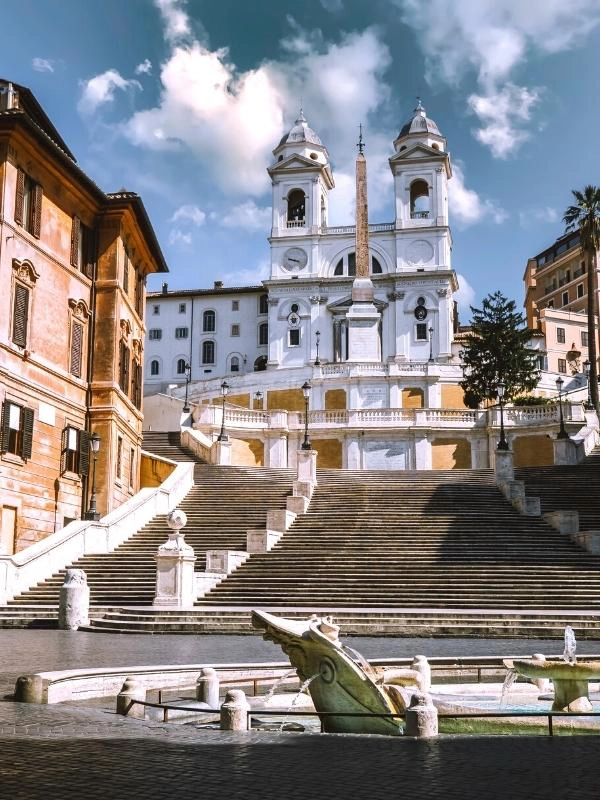 wide and ornate steps with white washed church at the top