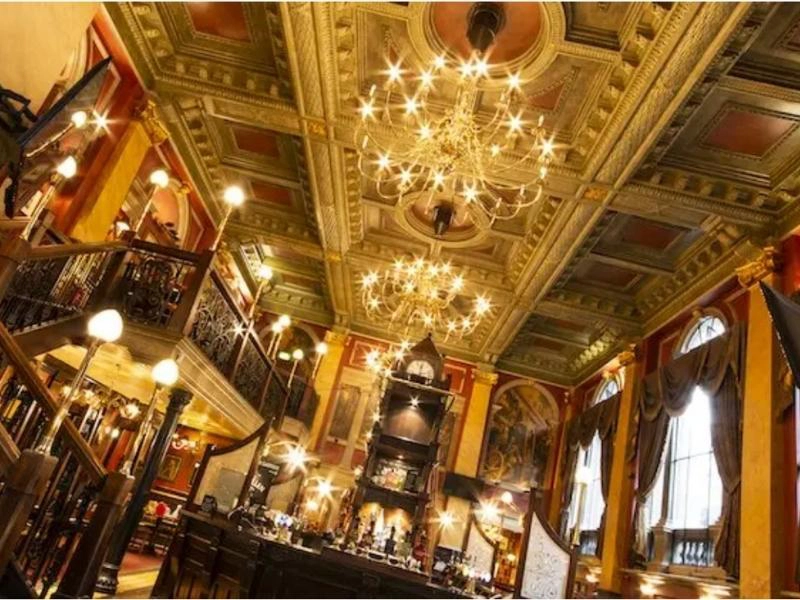 the inside of an olde worlde pub in London