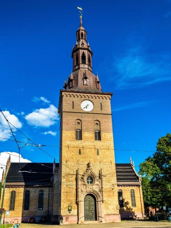 blocky church tower in brown brick