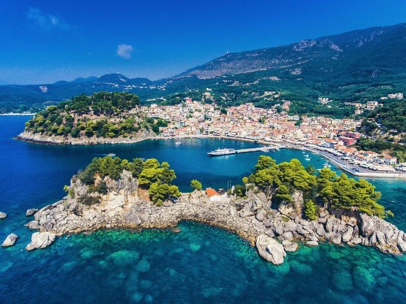 Turquoise sea by small Greek coastal town