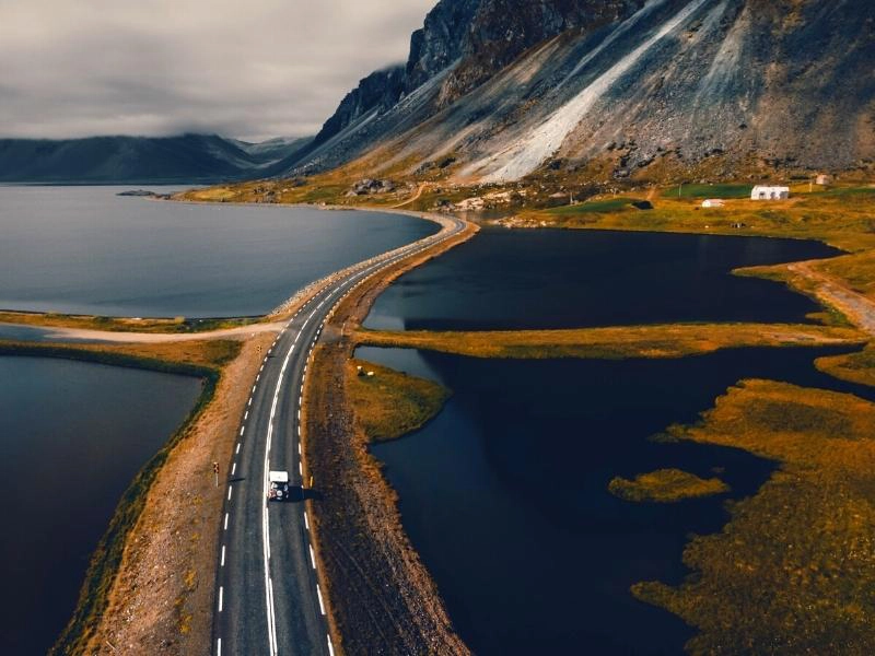 road on a narrow stip of land across the sea in Iceland