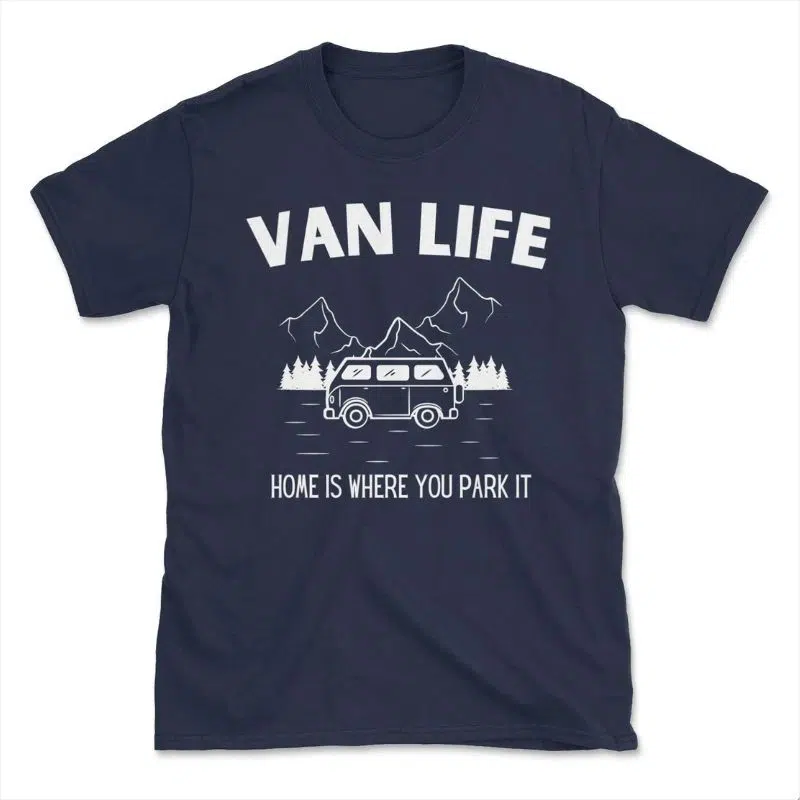 A navy t short with the words VAN LIFE above a drawings of a camper van with trees and mountains in the background.  Underneath is says Home Is Where You Park It.