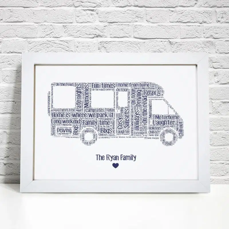 This image shows a blue motorhome shape design made up fo words, its on a white background with a white frame, underneath the motorhome is say The Ryan Family with a love heart.