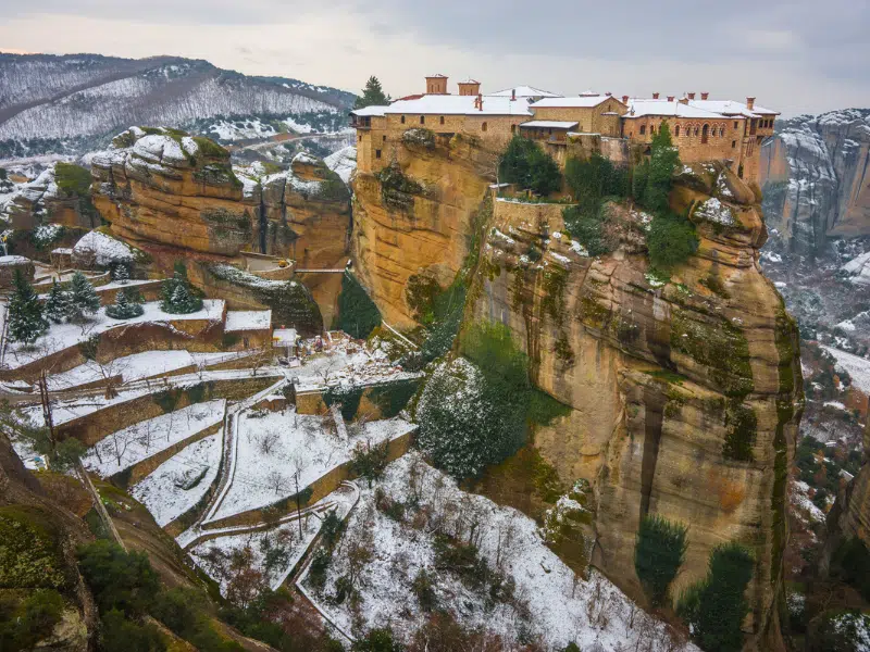 The rocks and monasteries of Meteora covered in snow
