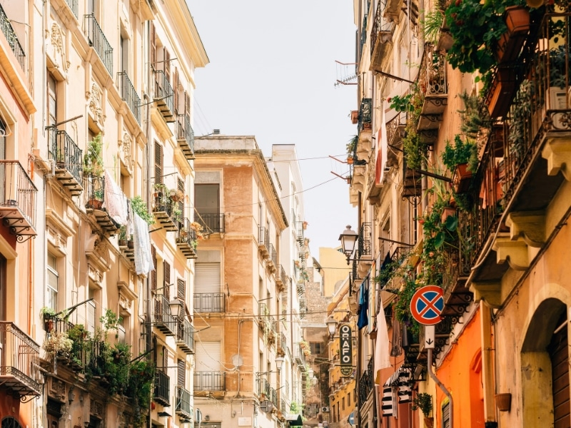 Creamy stone town houses with wrought iron balconies in a European city