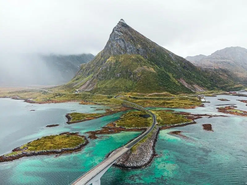 Road bridge across turquoise sea in Norway