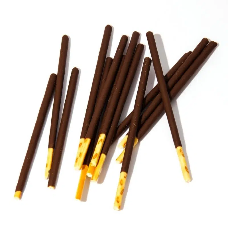 An image of long thin biscuits covered in chocolate.