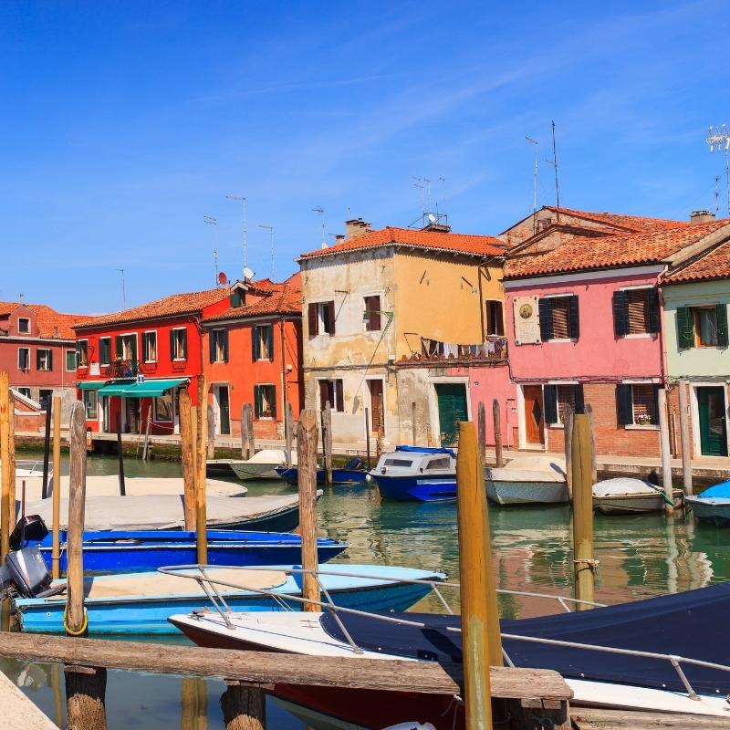 An image of multi coloured houses in Murano