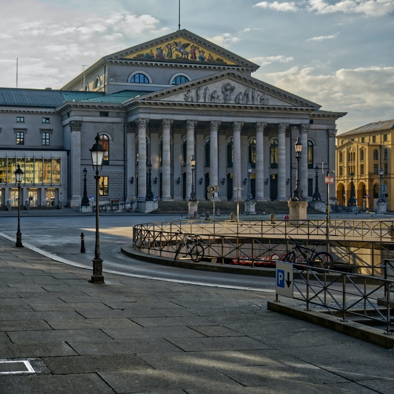 An image of the front of the National Theatre with its romanesque columns