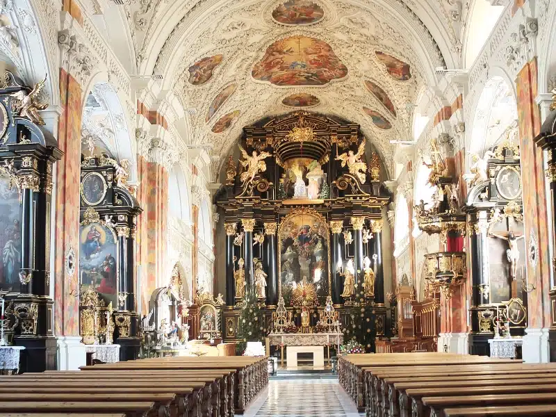 ornate church interior with a painted ceiling