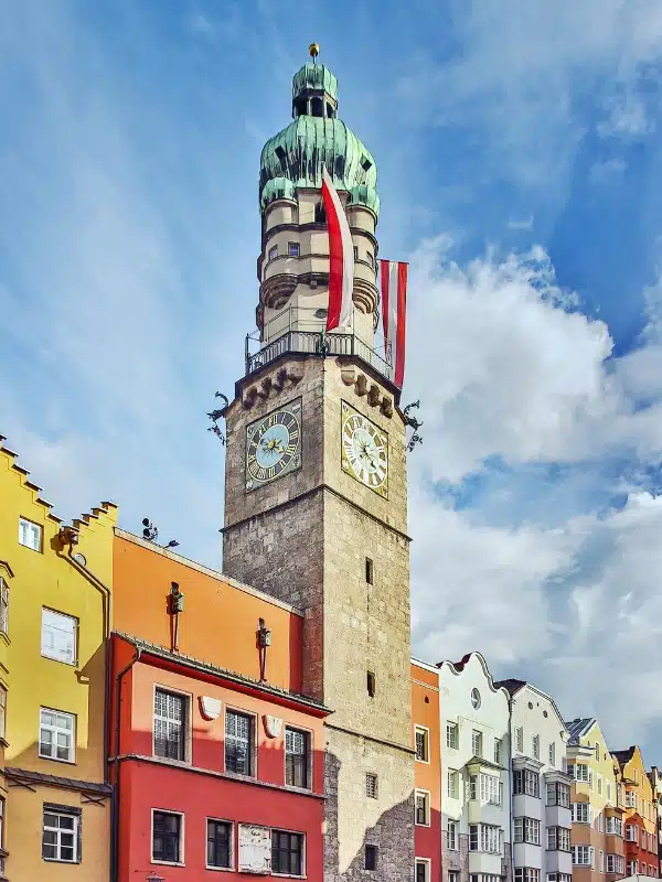 tall tower with a copper onion dome