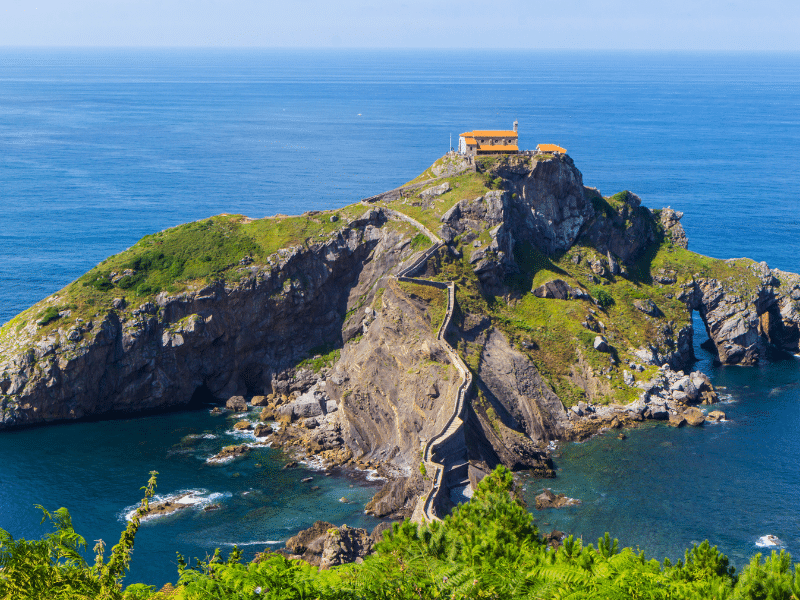 Small island with a church reached by a long walled staircase