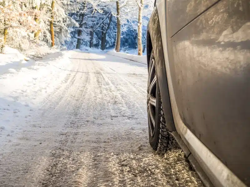 Snow and ice on a forest road in Germany