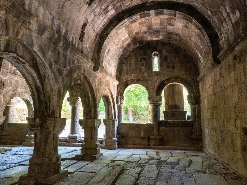 arched walls and stone columns in an Armenian monastery
