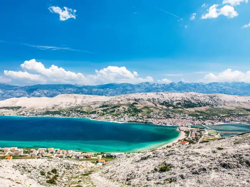 the island of Pag and a turquoise sea inlet