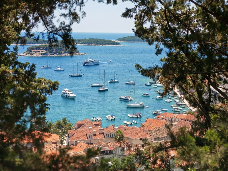 yachts at anchor in a village harbour