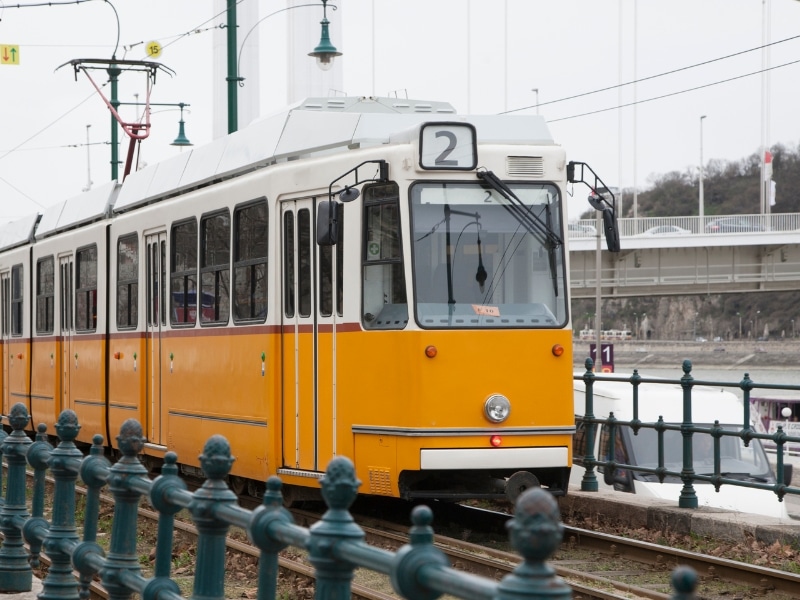 An image of a yellow tram