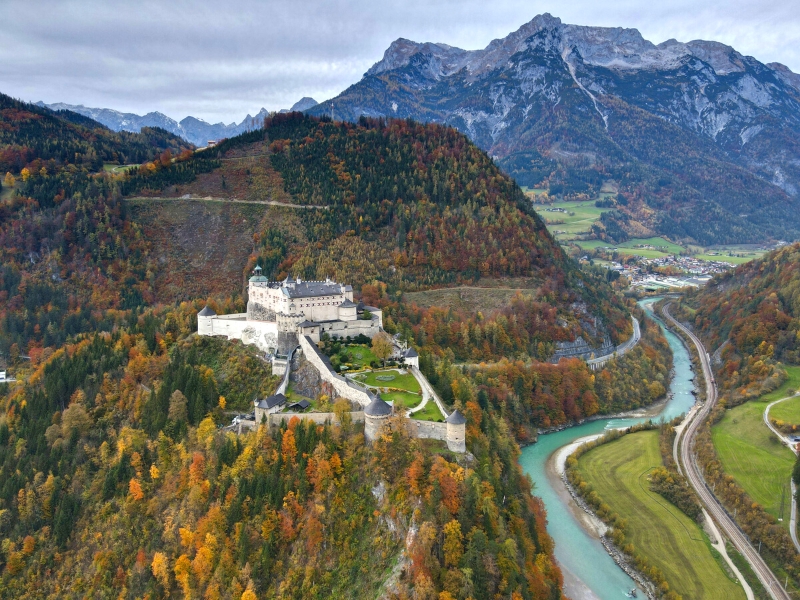 Turquoise river with a castle standing over it