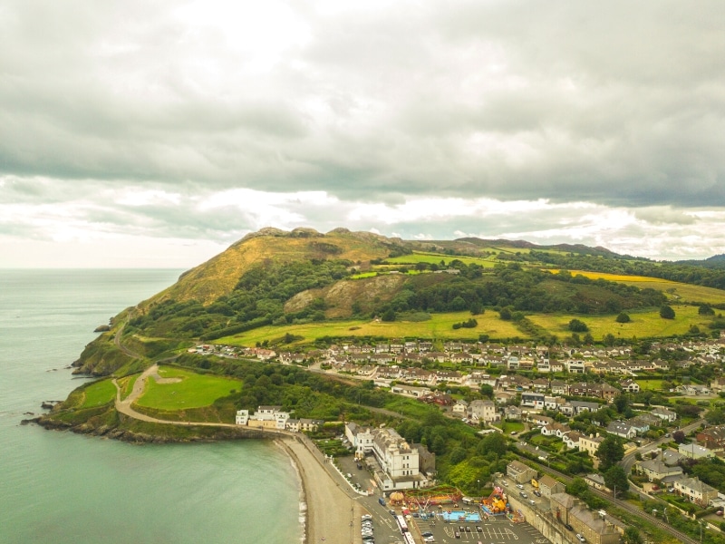 Seaside town with large headland behind