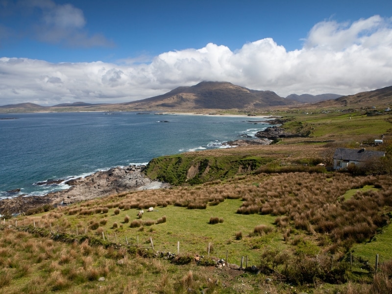view of fields across to a beach and mountains