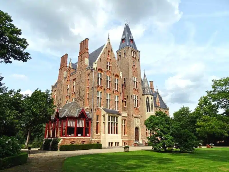 Grand casle with lawn and gravel path