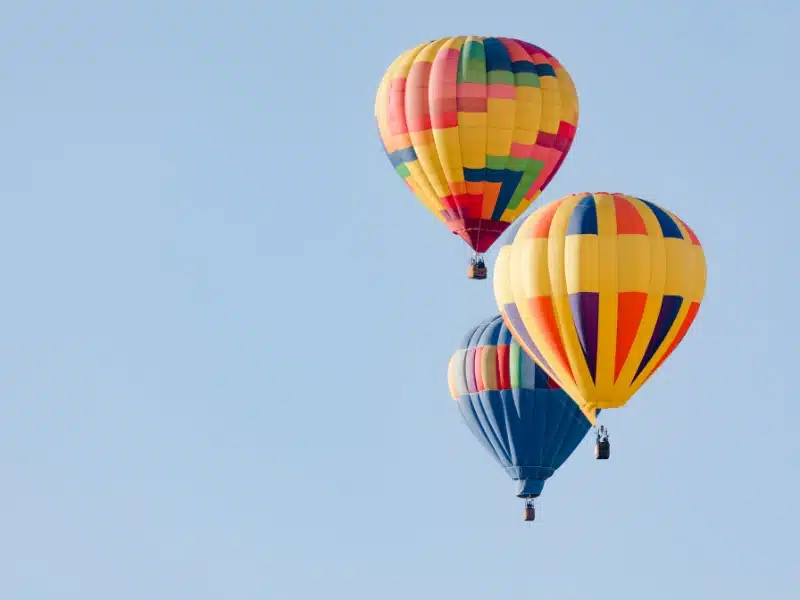 hot air balloons in a blue sky