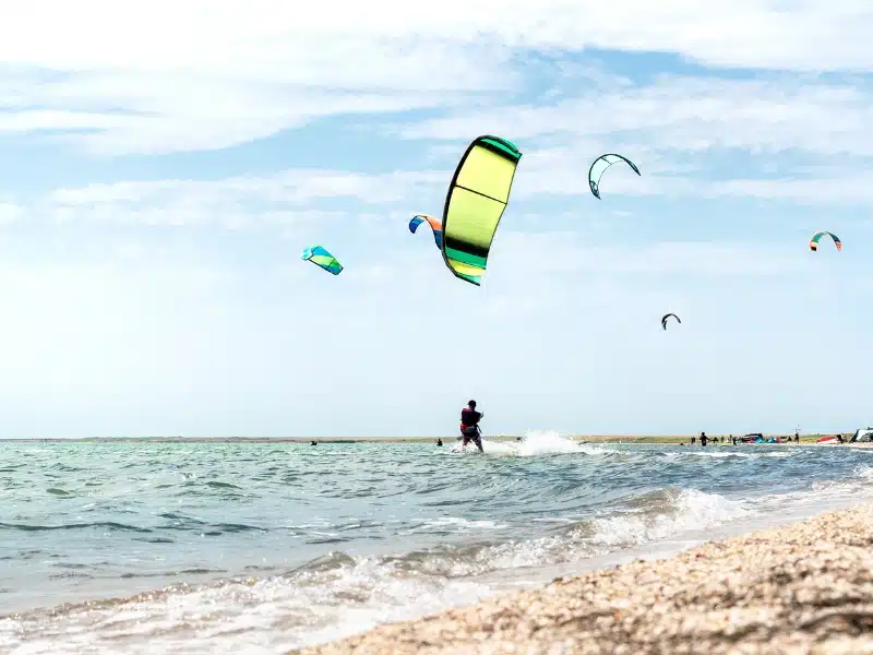 kitesurfing from a shinle beach