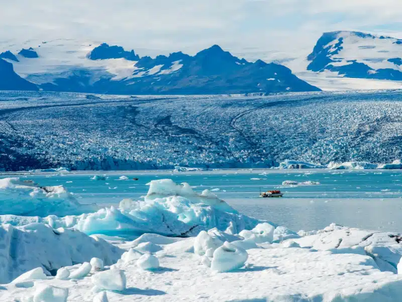 Glacial lake surrounded by snow and ice