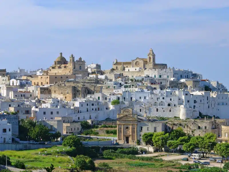 white houses of Ostuni with the contracting stone cathedral at the highest point