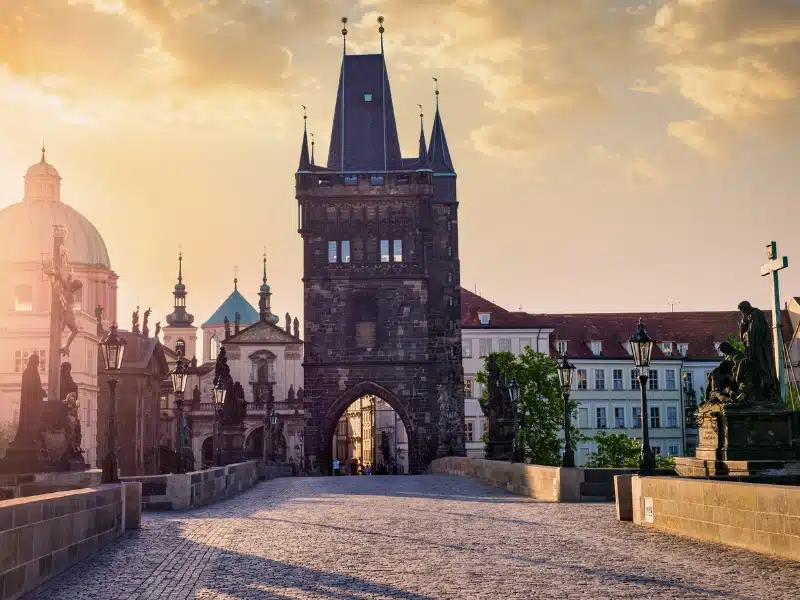 Charles bridge tower in Prague at sunrise, Czech Republic